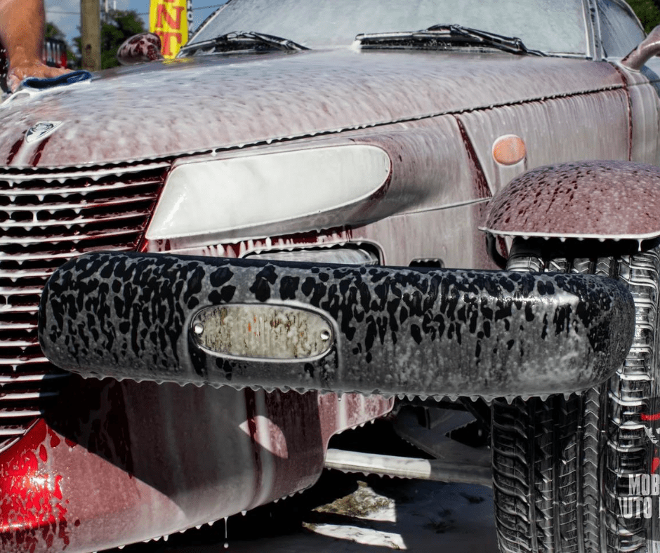 Dodge Prowler being washed during professional detail job